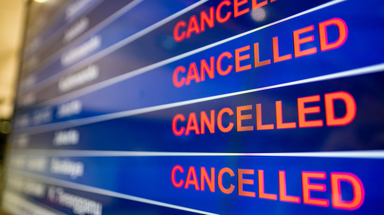 Departures board with canceled flights