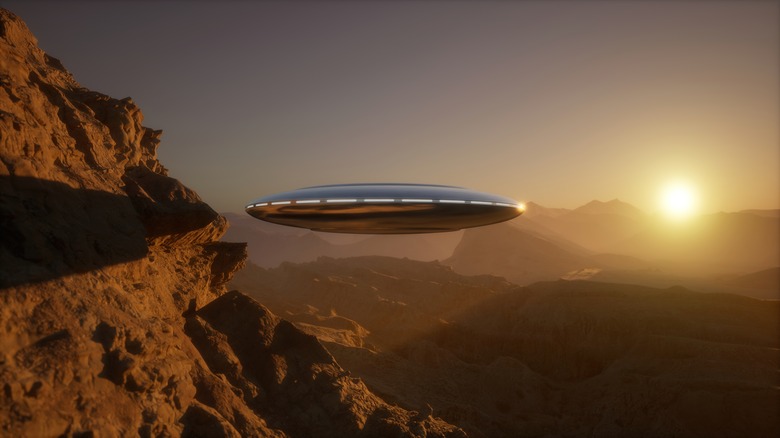 Flying saucer near mountain