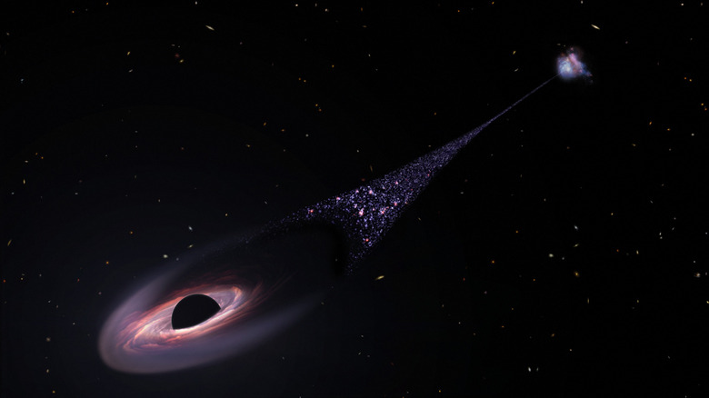 Black hole flung out of galaxy trail of stars in wake