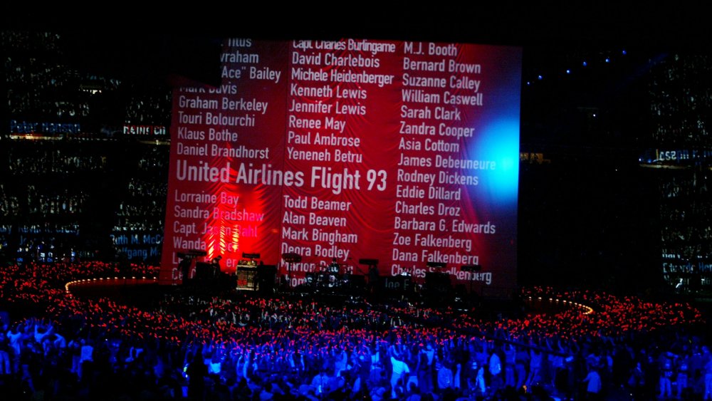 U2 on stage crowd list of flight 93 passengers on screen