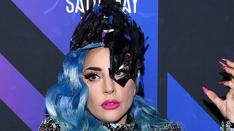 Lady Gaga wearing mask hat blue hair