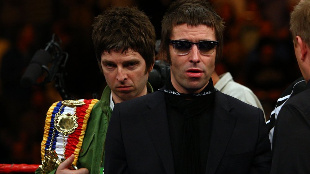 Noel and Liam Gallagher looking angry together