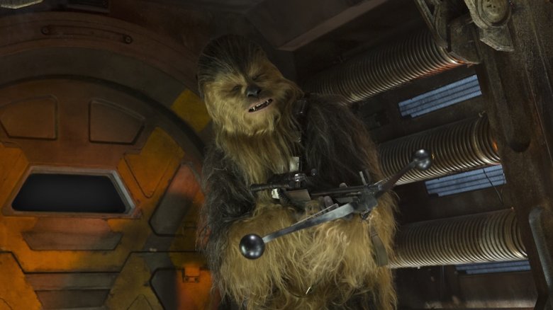 Chewbacca with his bowcaster in The Force Awakens