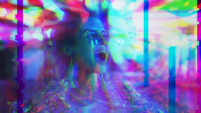A girl in sunglasses with psychedlic colors