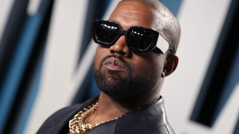 Kanye West in shades at the Vanity Fair Oscar Party
