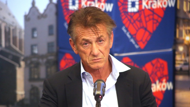 Sean Penn at a microphone