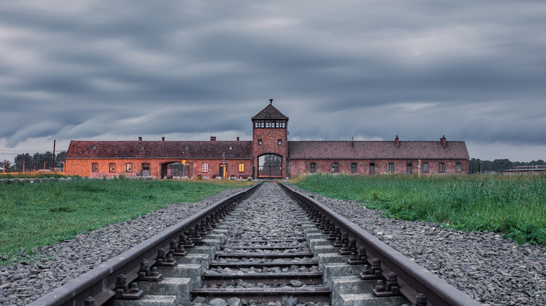 Auschwitz train track entrance 
