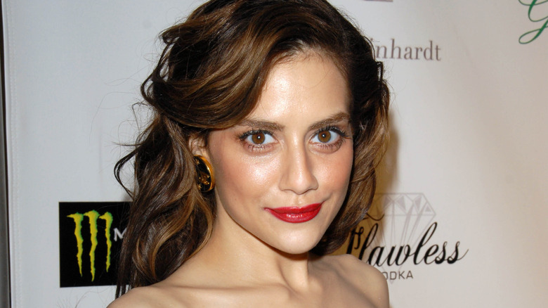 Brittany Murphy smiling red lipstick