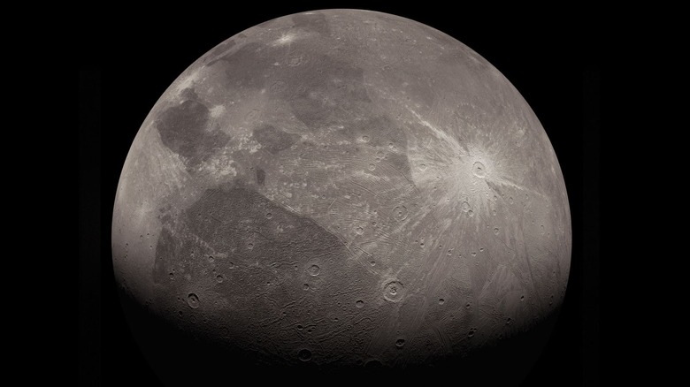Ganymede showing dark patches and a rayed crater