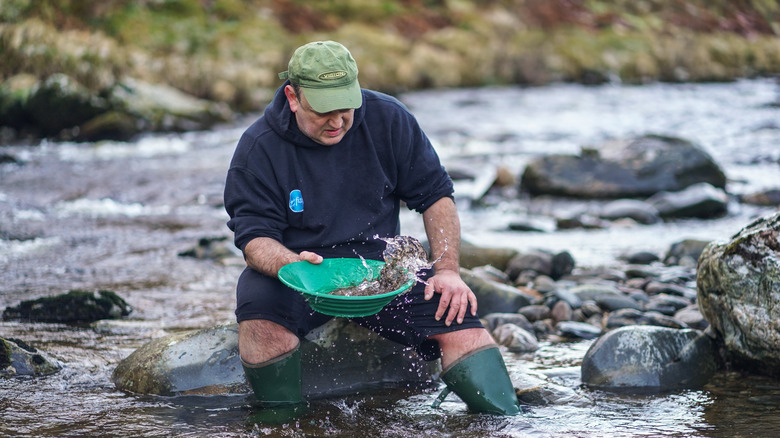 a man panning for gold