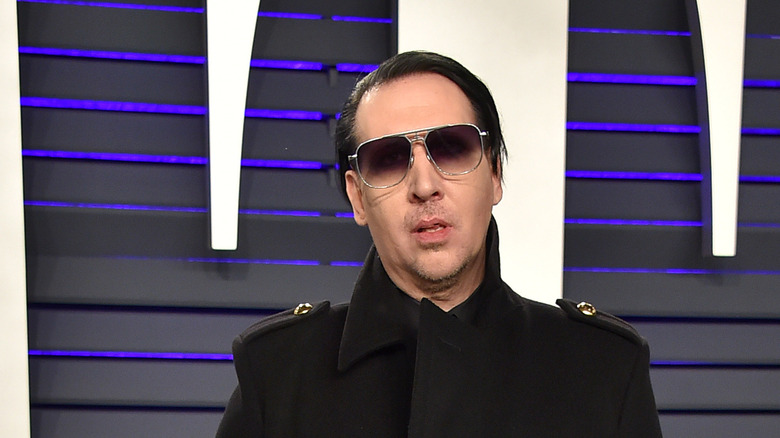 Marilyn Manson staring ahead sunglasses