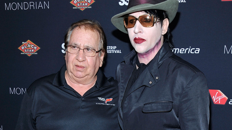 Marilyn Manson poses with his dad