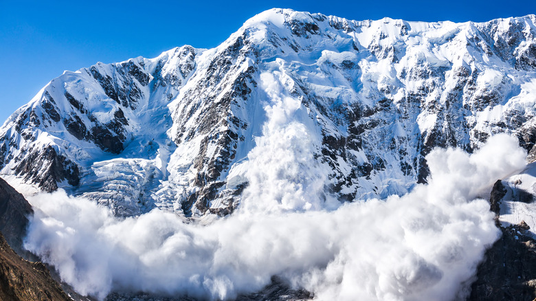 Avalanche tumbling down mountainside