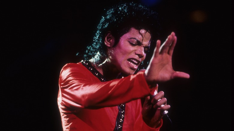 Michael Jackson red suit performing on stage
