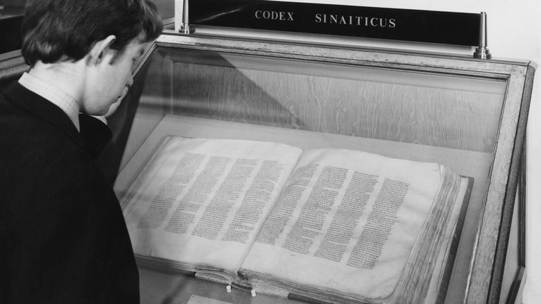 Codex Sinaiticus on display woman looking