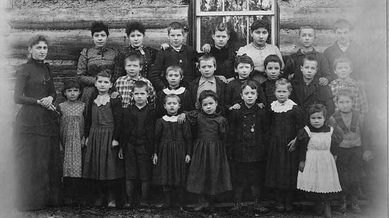 1800s teacher with students