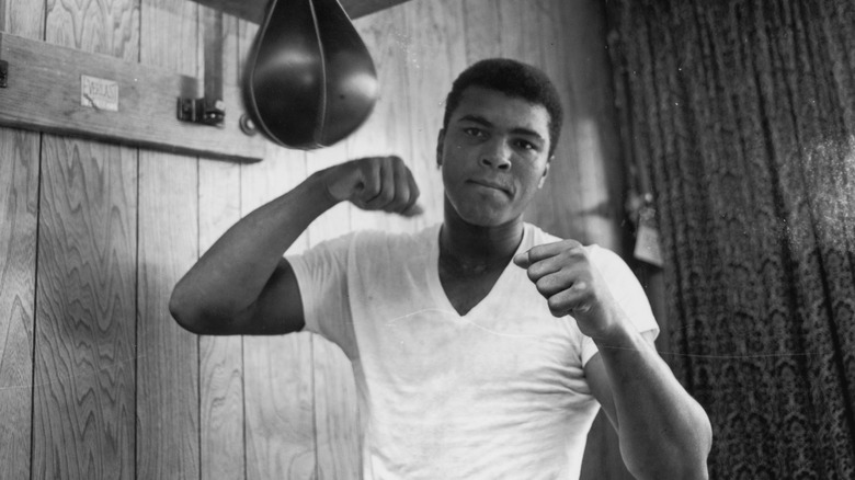 Muhammad Ali fists raised