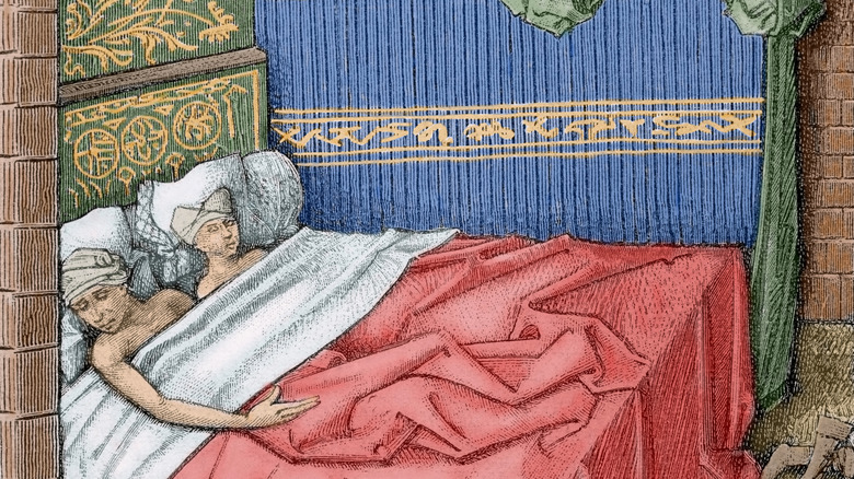 medieval couple in bed