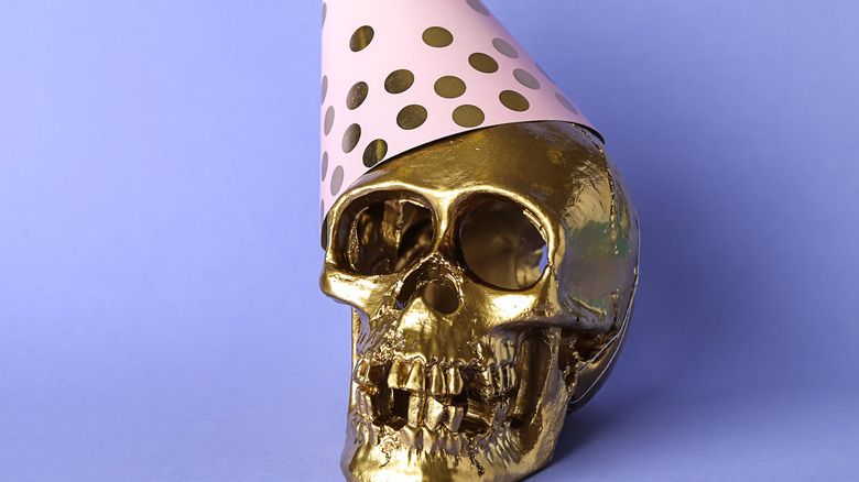 skull with a birthday hat