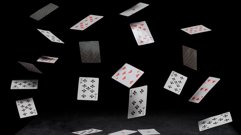 playing cards falling