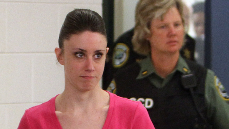 Casey Anthony in pink shirt