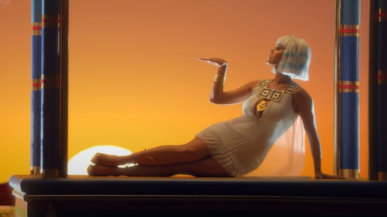 Katy Perry reclines against a sunset