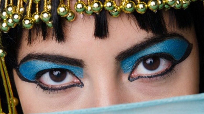 Woman wears Egyptian-style makeup