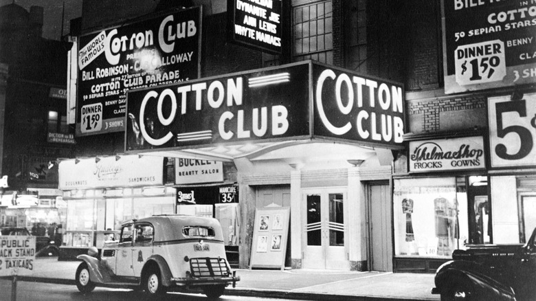 Cotton Club Marquee lit up with cars