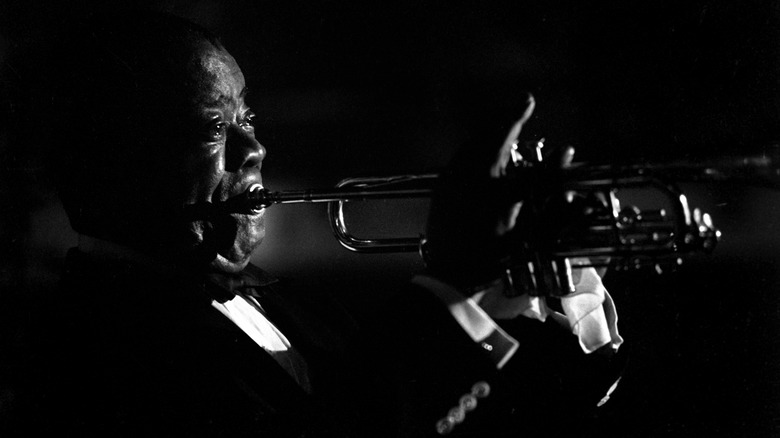 louis armstrong playing trumpet