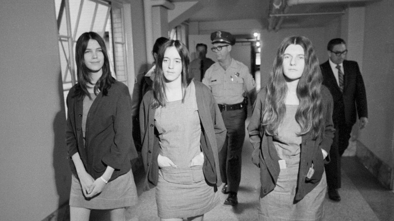 Three women from the Manson family in matching clothes