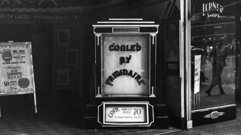 Sign outside theater advertising air conditioning