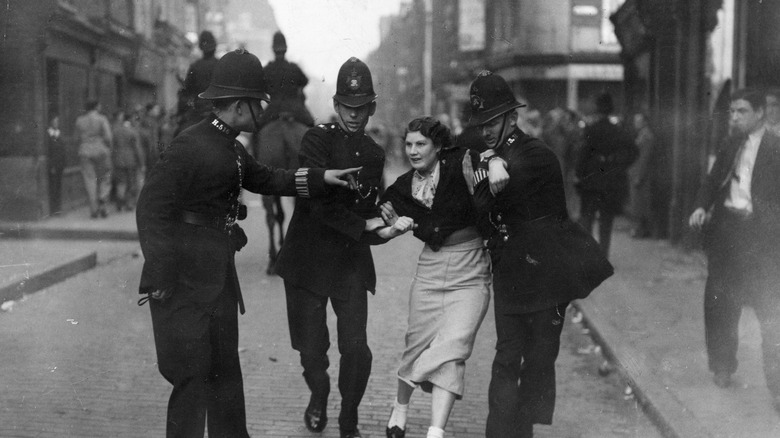 Woman being arrested during the Battle of Cable Street