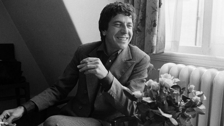 Leonard Cohen smiling with cigarette 