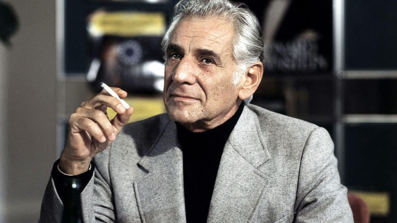 Leonard Bernstein holding a cigarette