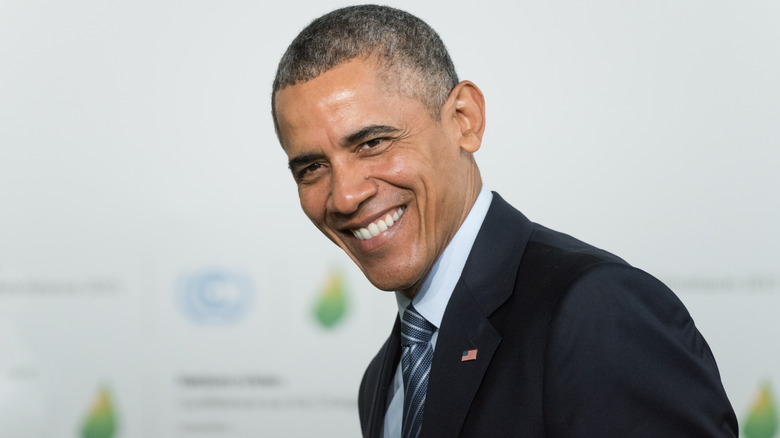 Obama grinning victoriously