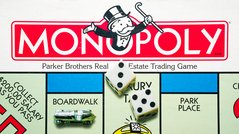 Monopoly game logo and dice