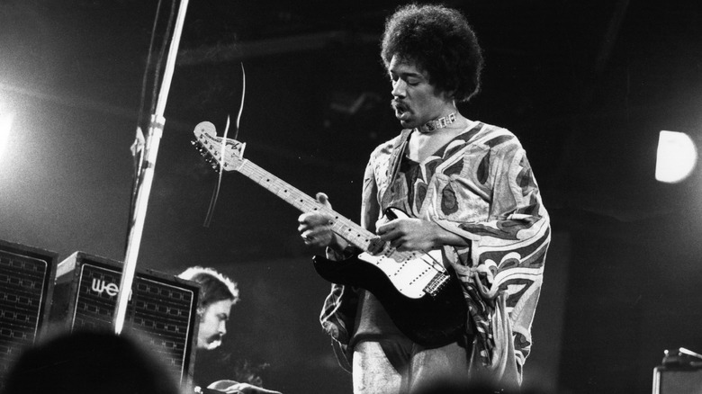 Jimi Hendrix playing guitar