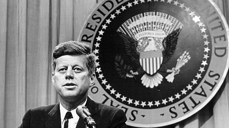 JFK with presidential seal