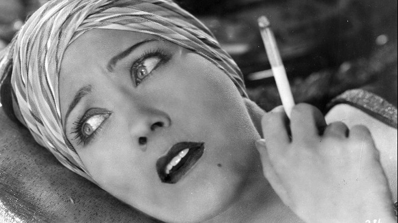 Gloria Swanson with a cigarette