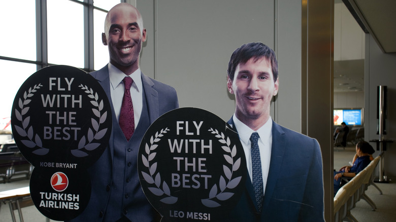 Bryant and Messi cardboard cutouts