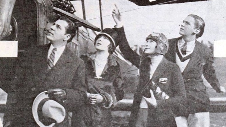 Gladys Roy points up, 1925