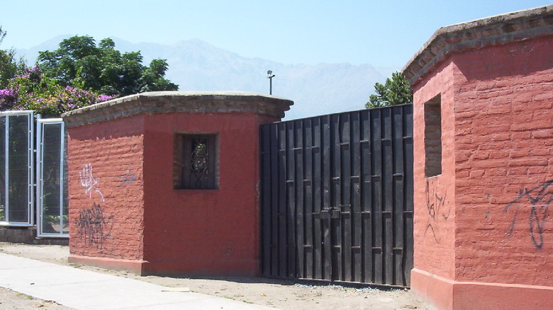 Brick walls line Villa Grimaldi entrance