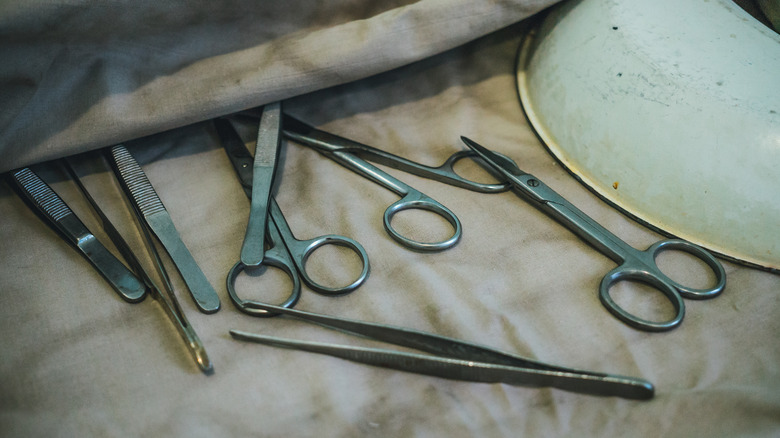 variety of old surgical tools