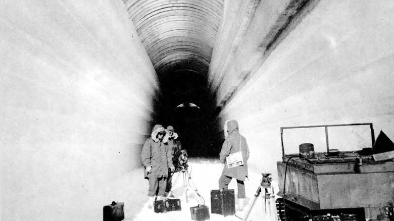 people working in ice tunnel