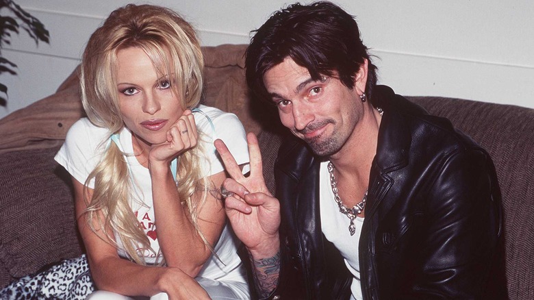 Pamela Anderson serious and Tommy Lee smiling