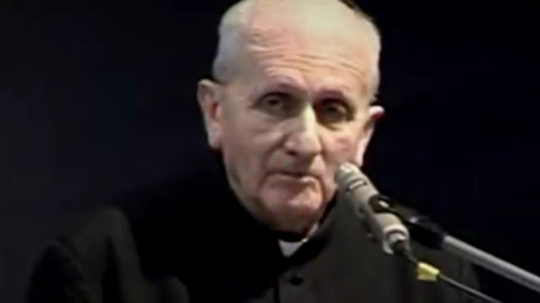 Father Marian Rajchel speaking