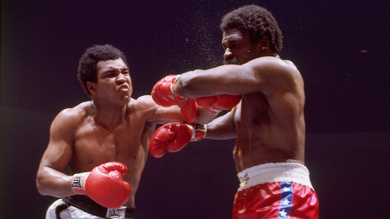Muhammad Ali punching Ron Lyle