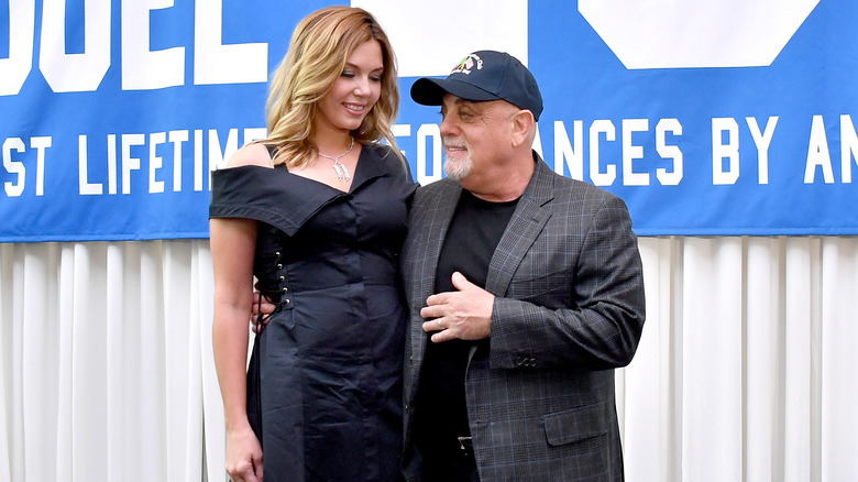 Alexis Roderick and Billy Joel at press conference