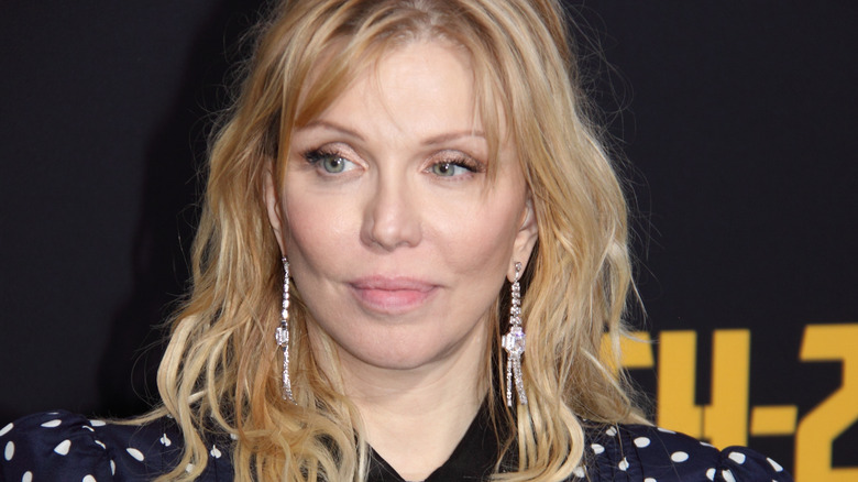 Courtney Love frowning
