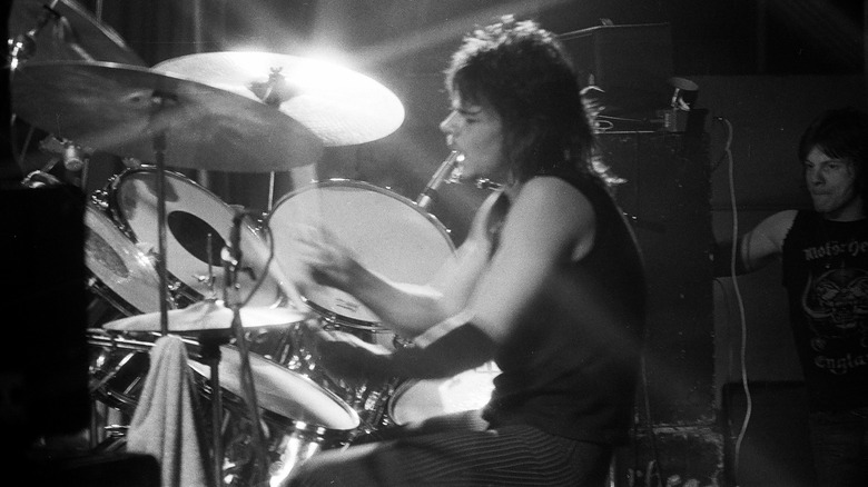 Phil Taylor playing drums onstage